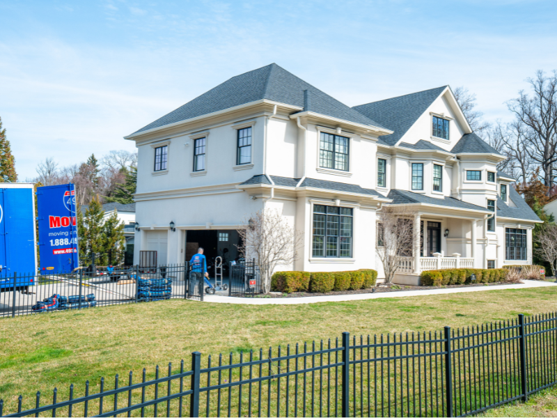 495 Movers truck parked in front of house