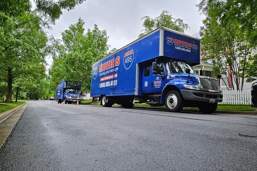 495 Movers truck parked on residential street in DC for move.